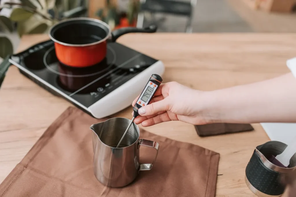 digital meat thermometer and oil pot